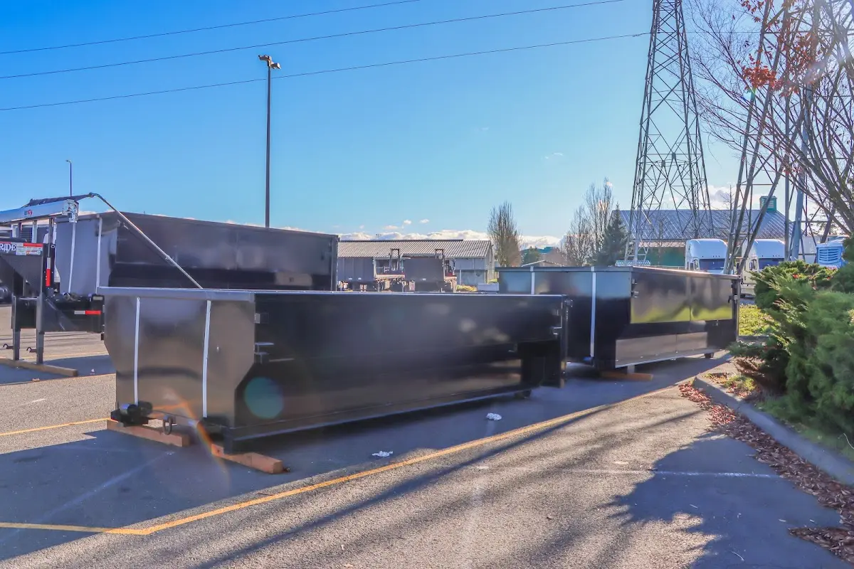 Roll-off dumpster ready for waste disposal at job site for 12 Yard Dumpster Rental in Ottumwa